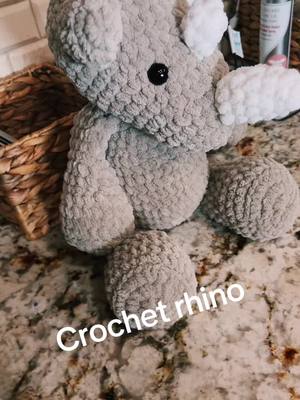 A post by @namelessboutique on TikTok caption: My friend is having a baby and wanted a rhino.