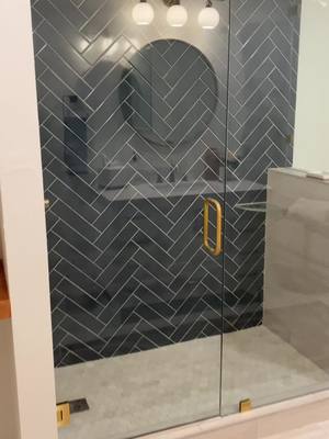 A post by @realestateinokc on TikTok caption: Shower tile love #tile #showermakeover #bathroomdesign 