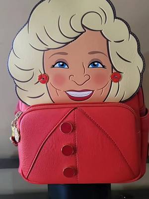 A post by @frogtales7 on TikTok caption: Lovin my Golden Girl Rose  Loungefly! #Rose #GoldenGirls #BettyWhite #Loungefly #MiniBackpack #LoungeflyMiniBackPack #LoungeflyCollection #Collector #Collection #Loungefly #fyp #foryoupage #fypppppppppp