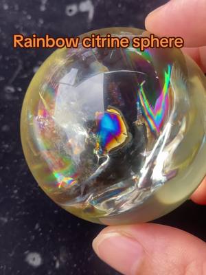 A post by @crystalhealingshop on TikTok caption: Rainbow citrine sphere #citrinecrystal #citrinequartz #citrinesphere #citrinespheres #crystalquartzstone #crystalquartz #crystalshop #crystalwholesaleshop #citrinecrystals