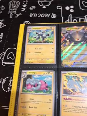 A post by @luniversgeekdemathias on TikTok caption: Voici Ma Collection Carte Booster Pokémon Écarlate Et Violet Évolutions À Baldea #pokemon #pokemonecarlate #pokemonviolet  #cartepokemon #collectioncartespokemon  #luniversgeekdemathias