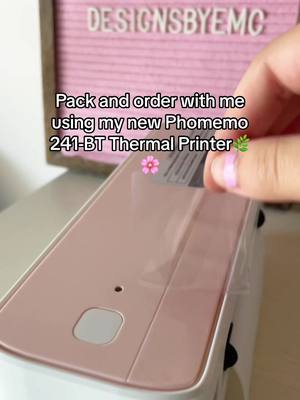 A post by @shopdesignsbyemc on TikTok caption: Love it!! #labelprinter #packanorderwithme #orderpacking #SmallBusiness #jewelrybusiness #preppyjewelry 