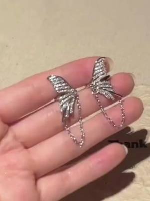 A post by @jannyjewelr on TikTok caption: #butterflies🦋 #earrings 