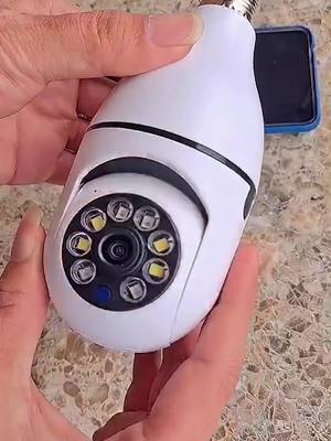 A post by @kikihoneyway on TikTok caption: This is a lightbulb security camera with 360-degree view!#foryou 