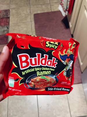 A post by @ewatty79 on TikTok caption: Trying the 2x Spicy #buldaknoodles 🔥 #spicybuldaknoodles #spicy #yummy