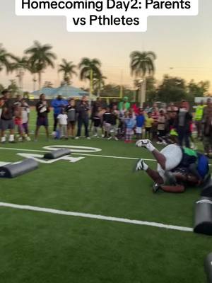 A post by @sanchalouis on TikTok caption: Homecoming Day 2: Parents vs Athletes the athletes were the MOST WANTED because the parents rounded 'em up and laid 'em out on their own turf!! #athletes #sonvsdad #football #littleleague #sanchalouis #fypシ゚viral #fyp #devils #bluedevils #littleleaguefootball #parentsvskids