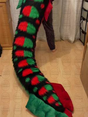 A post by @mysticthetragolf on TikTok caption: The tail is complete! #furryfandom #furry #furrytiktok #fursuit #fursuitmaker #commission #commissionsopen #furrys 