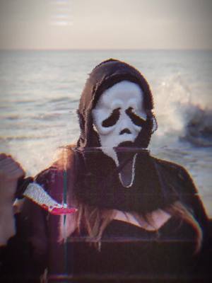 A post by @cortneymarie13 on TikTok caption: The beach isnt even safe anymore. #ghostface #fyp #spookyseason #scream #CapCutHalloween #TikTokHalloween #CapCut