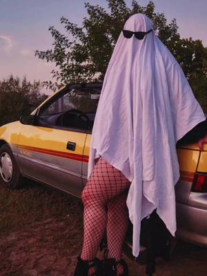 A post by @cortneymarie13 on TikTok caption: 92 Geo Metro 💛 #fyp #geometro #sheetghost #halloweenphotoshoot #spookyphotoshoot #thickghost