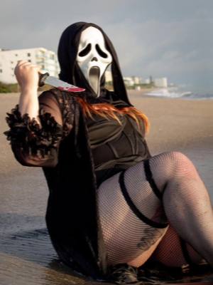 A post by @cortneymarie13 on TikTok caption: 🖤 #fyp #Ghostface #beachy #halloween #halloweenphotoshoot #thickandspooky