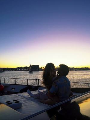 A post by @nategarner on TikTok caption: Can't beat sunsets on the yacht 🌅 #date #sunset #datenight #yacht #highvalueman 