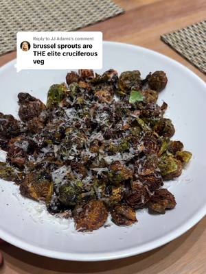 A post by @reecekennedy04 on TikTok caption: Replying to @JJ Adams Crispiest Brussel Sprouts Ever -Cut Brussels in Half -Deep Fry over Medium Heat 7ish Minutes -Hit with S&P Immediately -Meanwhile, reduce Balsamic Vinegar until pretty thick #cooking #balsamicglaze #brusselsprouts 