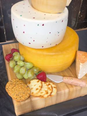 A post by @sublimecakedesign on TikTok caption: Its cheese…cake! #isitcake #cakeart #cakedecorating #buttercream #nofondant #cheese #cheesetax #cheesecake #fyp #redding 