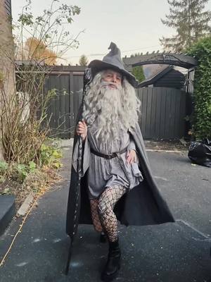 A post by @blackwoodcastleclothing on TikTok caption: Genderqueer Gandalf forever 🤍🧙🏻‍♂️ #halloween2023 #gandalf #lotr #halloweencostume #blackwoodcastle #halloweenlook #meangirls