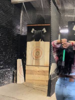 A post by @alykharel on TikTok caption: #axethrowing #fyp #toronto #batlaxethrowing #activity