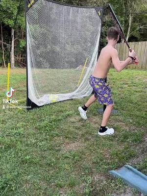 A post by @xokristinaxox on TikTok caption: Swing batter batter. Look at my baby 💕 Do your kids play sports? #Batting #BattingPractice #Softball #SoftballLife #BattingNet #HittingBalls #softballTok #Mom #MomTok #SoftballToks #Baller #MomLife #Practice #PracticeMakesPerfect