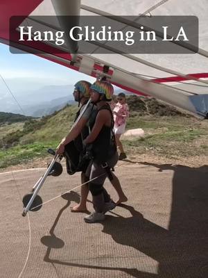 A post by @jhanawaddell on TikTok caption: Decided to go Hang Gliding for my birthday. Name a betterway to bring in 28?…I’ll wait ☺️ #birthday #hanggliding #wheresbanana