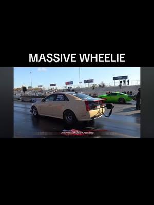 A post by @slow_sedans on TikTok caption: #fyp #wheelie #cars #racing 