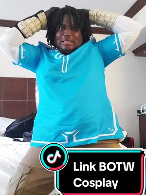 A post by @doodlerobcosplay on TikTok caption: Another fantastic sound lol #linkcosplay #legendofzelda #legendofzeldacosplay #botw #botwcosplay #breathofthewildlinkcosplay #breathofthewild #breathofthewildlink #LOZ #lozcosplay #blackcosplayer #BlackCosplay