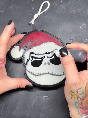 A post by @thatcandlestuff on TikTok caption: Sandy Claws 