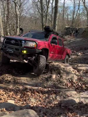 A post by @kylesprouse0 on TikTok caption: Ole girl goes pretty good for no front locker and 32s #toyota #tacoma #trd #offroad #trucks #rocks #rockcrawler #fyp #foryoupage 