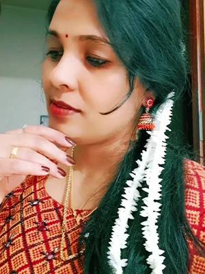 A post by @manjujoseph23kannur on TikTok caption: ♥️♥️♥️♥️♥️🩷🩷🩷🩷🩷🌈🌈🌈🌈🌈💟💟💟💟💟#romantic #foryou #foryoupage #manjujoseph #viraltiktok #Love #tamilsonglyrics #eshtam ✌️