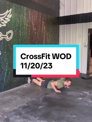 A post by @tkoprogramming on TikTok caption: Monday Crossfit Workout! AMRAP 10 - 4 Wall Walk - 7 Kettlebell Clean & Jerk (53lbs/35lbs) - 10 Calorie Bike (Females do 8) #wallwalk #wallwalks #crossfit #crossfitworkout #crossfitworkouts #echobike #kettlebellworkout #crossfitwod 