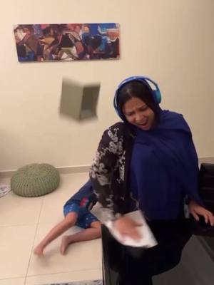 A post by @agzarbaquer on TikTok caption: Funtime at home  #momandson #funny #meme #mydubai #comdey #malucomedy #shenanigans 