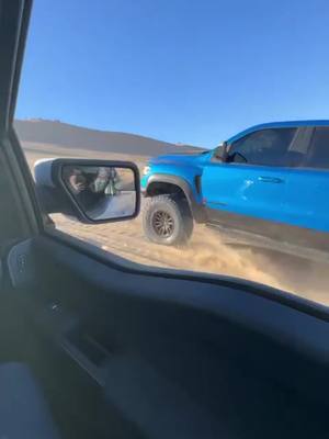 A post by @danmtz_ on TikTok caption: RAPTOR R VS TRX🤣 #RAPTORR #R #RAPTOR #KINGOFTHEROAD #KINGOFTHEJUNGLE #TRX #RAM #DODGE #HELLCAT #supercharger #WHINE #FAST #FASTTRUCKS #OFFROAD #trucksoftiktok #V8 #limitededition #LIMITED #FORD #fordperformance #FORYOU #RACING#RACE #offroading #POWER #gocryaboutit #PREDATOR VS #HELLCAT #BIGSQUISH #LIVINGMONSTER #KINGOFTHEDIRT #intoxicating #LUXURY #4wd #KENGRODYFORD #orangecounty #CALIFORNIA #FORYOU #VIRAL #SLOW #TRX 