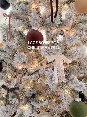 A post by @alaniestelle on TikTok caption: so happy i added this detail 🫶🏻 #lacebow #christmastree #christmas  #ornaments #DIY #diyornaments #holidays #apartment #christmasdecor #lace