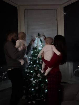 A post by @x.ellee on TikTok caption: Our first family chrismas tree🎄  #christmas #christmastree #family  #twins 