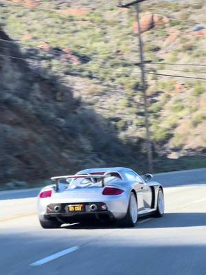 A post by @comp.m2 on TikTok caption: Music is all I hear 🎶 🎼   #cgt #carreragt #porsche #car #losangeles #foryoupage #fyp #v10 