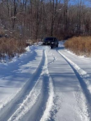 A post by @andrei_grisco on TikTok caption: Toyota Tundra and snow plow in use 