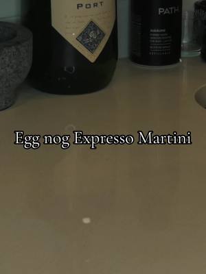 A post by @ms.citrusss on TikTok caption: Indulge in the festive fusion of flavors with this Egg Nog Wine-based Espresso Martini recipe if your looking for something thats not tequila or vodka this is the mix for you.🎄✨  Sip on the merry blend of velvety egg nog, rich espresso, and a splash of wine for the perfect holiday pick-me-up! 🍸🎁  @Owen’s Craft Mixers @trader joes  #HolidayCheers #EggNogEspressoMartini #capcutvelocity #traderjoes #owens 