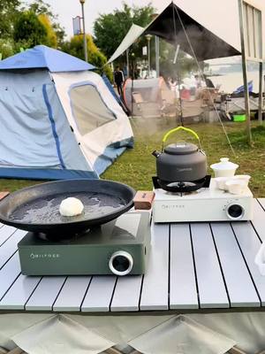 A post by @huacheng53 on TikTok caption: Outdoor picnic barbecue, the most suitable stove