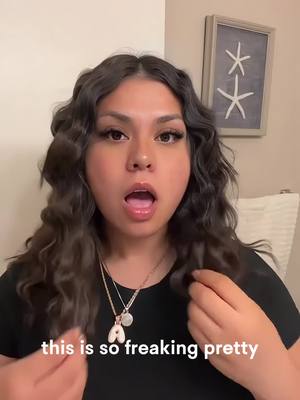 A post by @newmeofficial on TikTok caption: Big thanks to @alexa_de for showing us how to use our latest curling wand! If you've been struggling to find the perfect wand for shorter hair, this one's a game-changer. You'll be amazed by the results! #Newme #haircurler #haircare