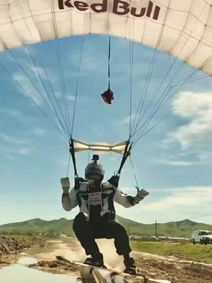 A post by @seanmaccormac on TikTok caption: Construction site aerial assault @Red Bull style @Red Bull Air Force #redbullgivesyouwings #skysurf 