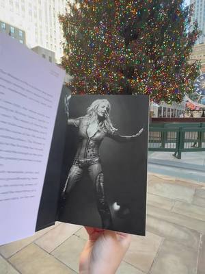 A post by @britneyspears on TikTok caption: Who’s ready to grab a cozy blanket … a cup of hot cocoa … and jump into #TheWomanInMe for some holiday reading 📖🎄🌟🤓 ??? britneybook.com  @Gallery Books @Simon & Schuster  