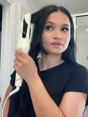 A post by @newmeofficial on TikTok caption: Big thanks to @kenzielovee0 for creating this amazing video showcasing our automatic curling iron! 🌟 Can we take a moment to admire her gorgeous hair too? Absolutely stunning! 💁‍♀️✨ #Grateful #Newme #autocurlingiron #haircurler 