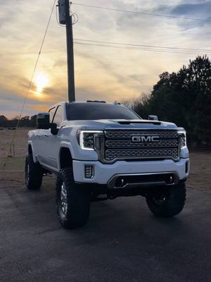 A post by @baileysmithh6 on TikTok caption: Jason>> #fyp #fypシ #bubbatruck🌾 #40s #denali #trucktok #gmc #truck #liftedtrucks 