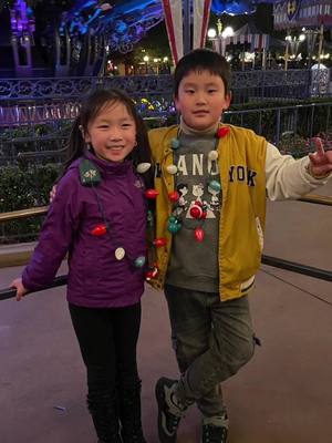 A post by @ on TikTok caption: Christmas reunion at Disneyland🎄❤️ #reunited #besties #buddies #foreverfriends #childhoodbuddies #christmas #christmasmagic #happytogether #happiness #disneyland #magicalplace #disneymagic #makingmemories #childhoodmemories #hellokpopkate @Disney Parks @Disney 