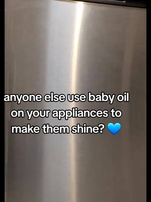 A post by @hotmess.mamaof5 on TikTok caption: #babyoil #stainlesssteel #appliances #stainless #cleaninghacks #cleaningtiktok #hotmessmamaof5 