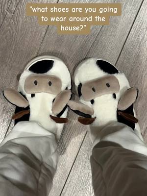 A post by @.greeneyedgf on TikTok caption: These clow slippers are to die for 🐄