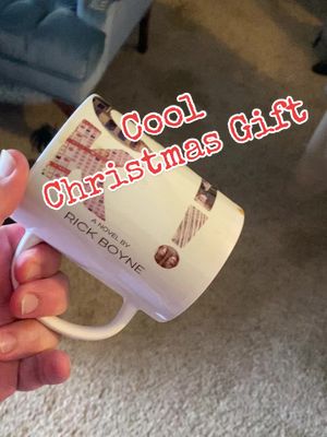 A post by @rickboyne on TikTok caption: my debut novel’s cover on a coffee mug #jackpot #bookcover #BookTok #authortok #gift 