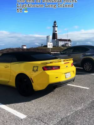 A post by @th3_3agle11 on TikTok caption: • The End of Montauk point lighthouse long Island Ny 🏝️🇺🇸🇦🇱 #th3_3agle11 #montauknewyork #montauk #longisland #kaziuvip #lighthouse #camaro #camaross #yellow #albania 