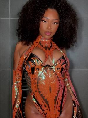 A post by @naturalbabepro on TikTok caption: This is Lava ❤️‍🔥🔥🌋. My new bodywear design for Trinidad Carnival . #carnival #carnivaloutfit #mondaywear #carnivalcostume #trinidadcarnival2024 #dancewear 