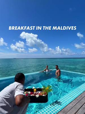 A post by @luxuryworldtravellers on TikTok caption: Having a private breakfast for two from the comfort of your own over water bungalow is a truly unique experience in the #Maldives. #luxurytravel #lux #luxuryworldtraveler #couplegoals #fyp 