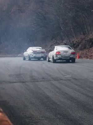 A post by @ill_vibe on TikTok caption: Music to my ears 😏  The actions in this video are performed by professionals. DO NOT ATTEMPT. #car #cars #carsoftiktok #jdm #jdmcarsoftiktok #jdmcarsoftiktok #jdmcars #bmw #nissan #toyota #gtr #supra #drift #drifter 