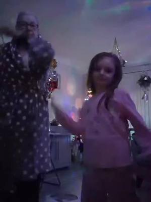 A post by @emmajohnston3022 on TikTok caption: My 7 year old daughtwr having a dance with her 80 year old greatgran #fyp #trending #foryou #kids #funny #dance #saltburn 