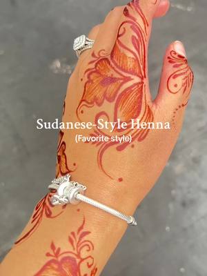 A post by @nvjmah on TikTok caption: Red henna for the win>> Sudanese style henna is top 2 but not 2 ☺️ #henna 